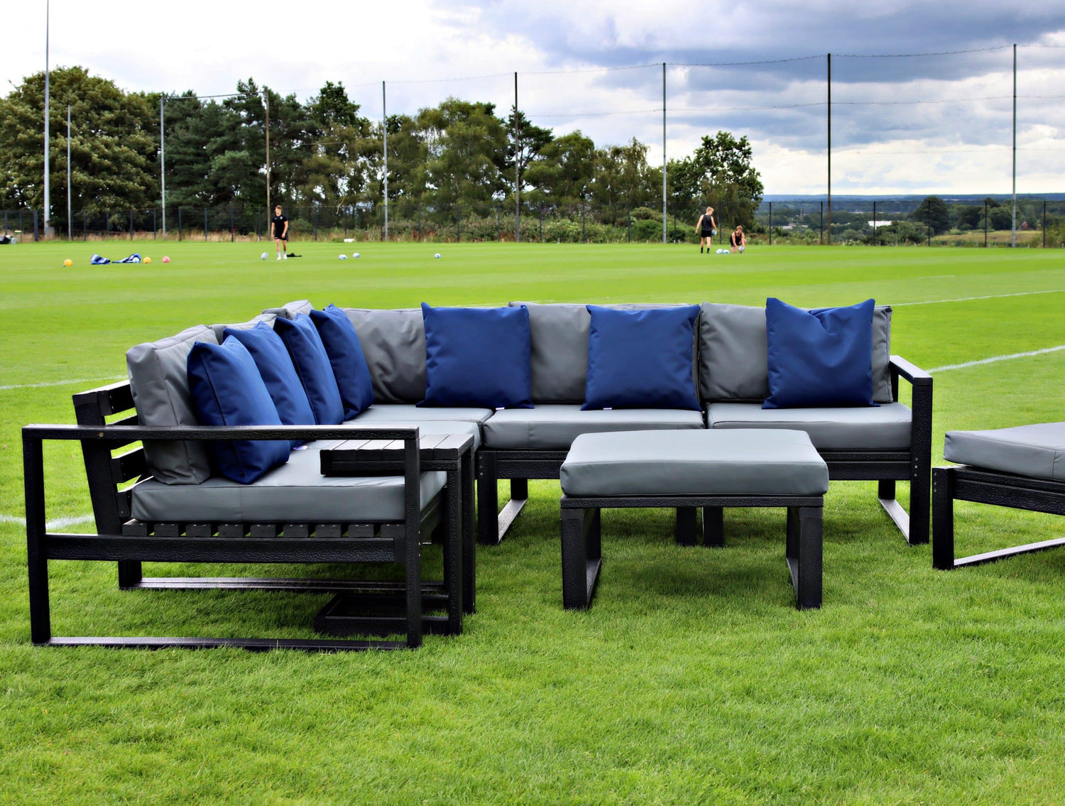 Salcombe Garden Sofa Set configured in a corner sofa with foot stool and chair