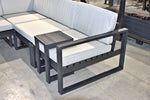 Salcombe Garden Sofa Set configured in a corner sofa with foot stool and chair